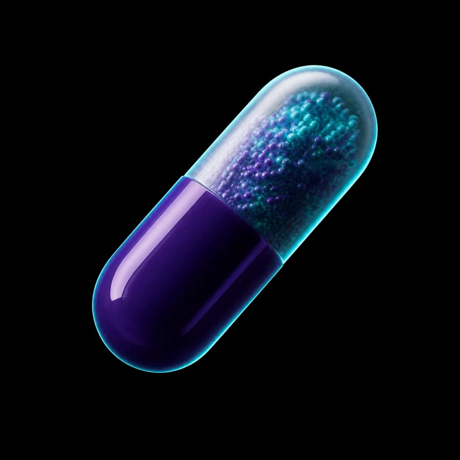 A Biocare hard capsule, violet and teal
