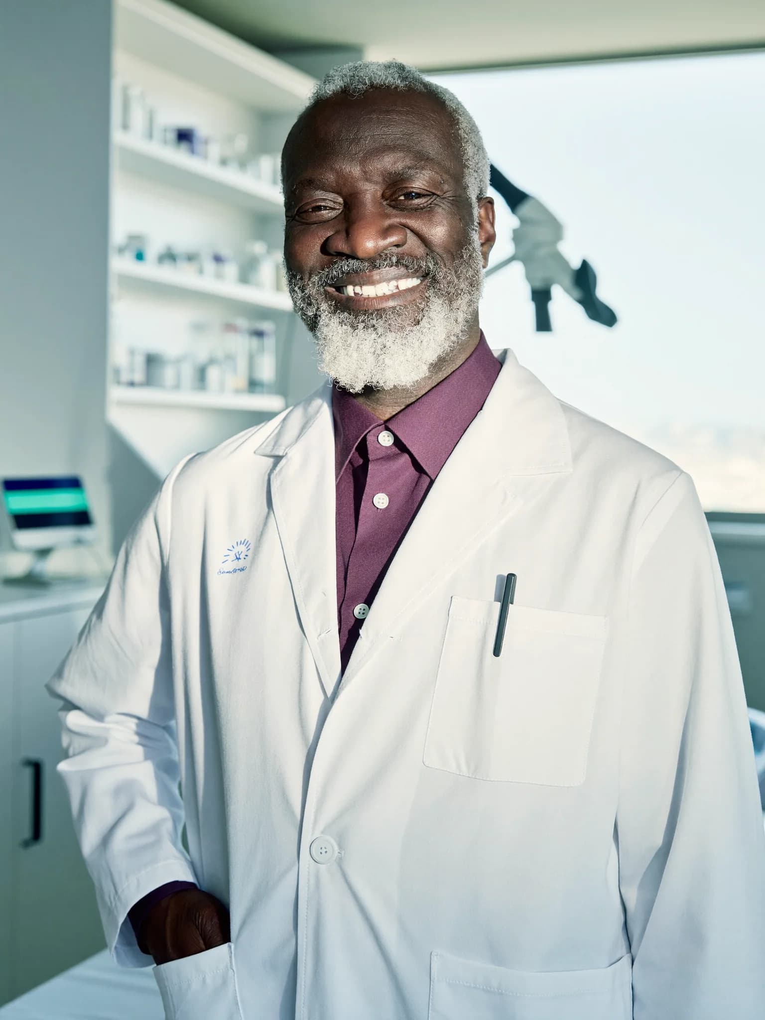 Senior Biocare scientist smiling in the laboratory